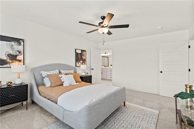408 Woodview Dr, Raymore, MO 64083 - bedroom featuring carpet, a ceiling fan, baseboards, and ensuite bath