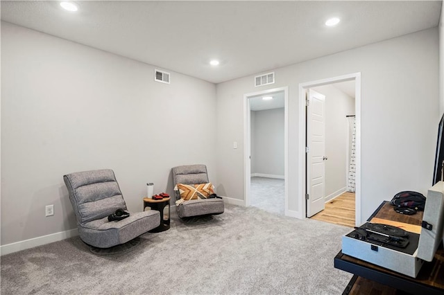 408 Woodview Dr, Raymore, MO 64083 - sitting room featuring carpet floors, recessed lighting, and baseboards