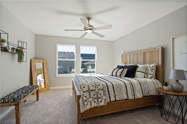 bedroom with ceiling fan and carpet floors