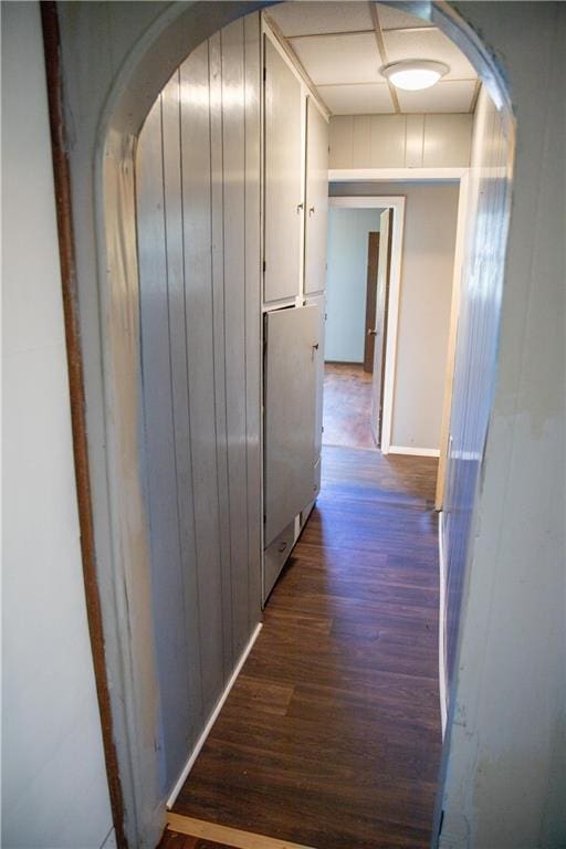 corridor featuring dark hardwood / wood-style floors