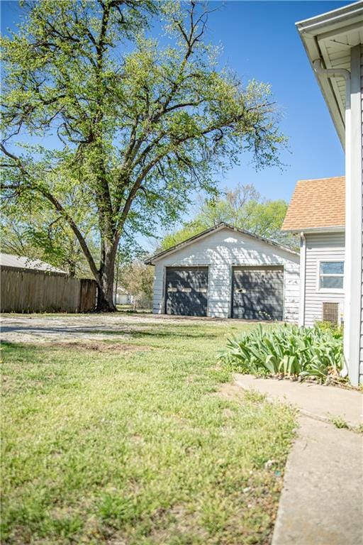 view of yard with a garage