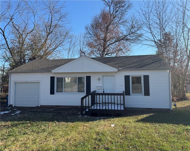 single story home with a garage and a front lawn