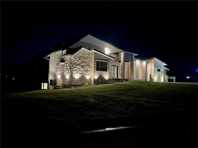 view of front of home with a yard