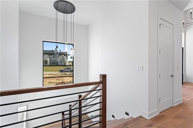 corridor featuring hardwood / wood-style flooring