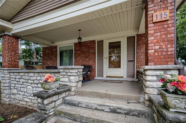 entrance to property with covered porch