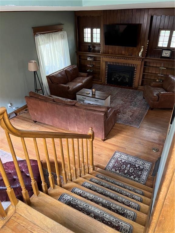 stairway featuring hardwood / wood-style flooring