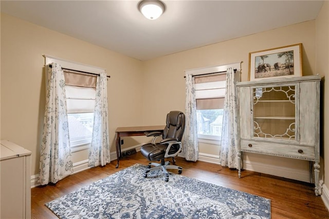 office area featuring hardwood / wood-style floors