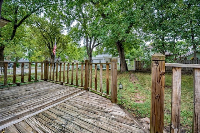 deck featuring a lawn