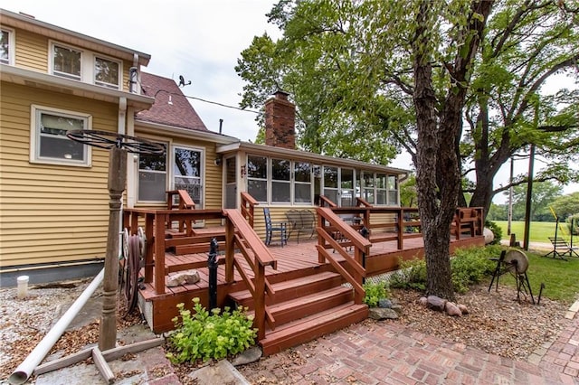 deck featuring a sunroom