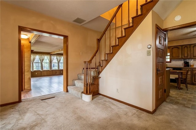 stairway with carpet floors