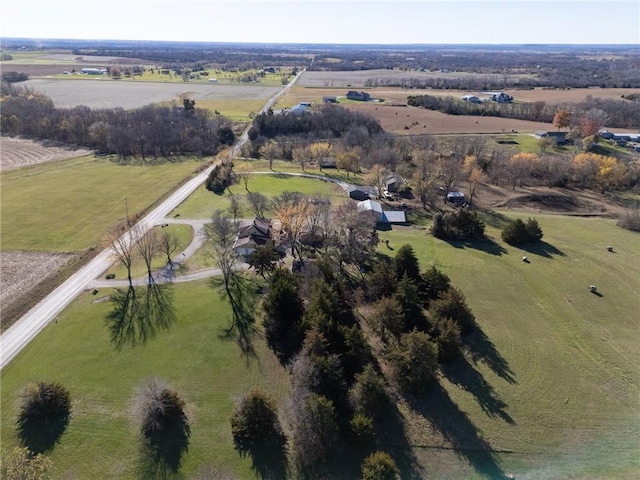 birds eye view of property featuring a rural view