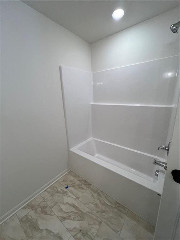 bathroom with shower / tub combination