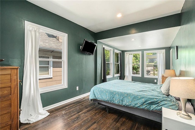 bedroom featuring visible vents, recessed lighting, baseboards, and wood finished floors