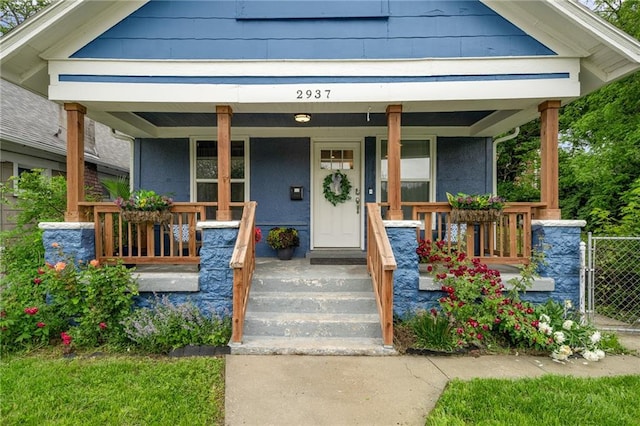2937 Paseo Blvd, Kansas City, MO 64109 - view of front facade featuring a porch