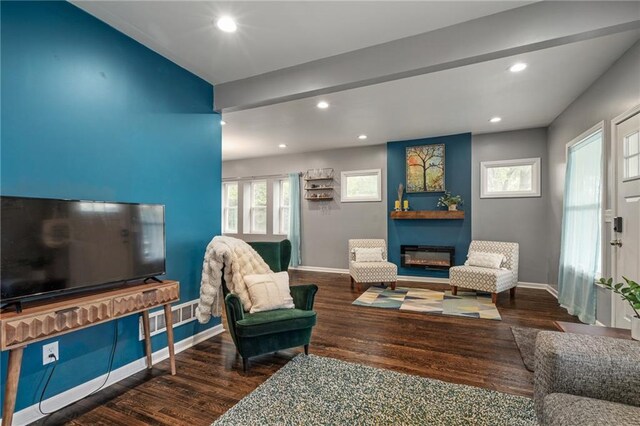 2937 Paseo Blvd, Kansas City, MO 64109 - living area with recessed lighting, wood finished floors, baseboards, and a fireplace