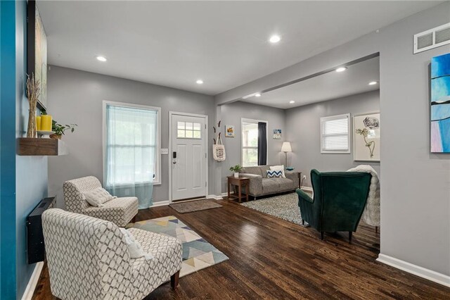 2937 Paseo Blvd, Kansas City, MO 64109 - living area featuring recessed lighting, baseboards, and wood finished floors
