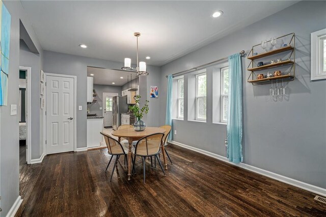 2937 Paseo Blvd, Kansas City, MO 64109 - dining room featuring dark wood-style flooring, baseboards, and recessed lighting
