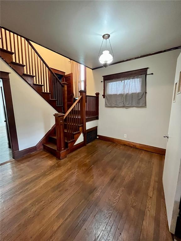 interior space with hardwood / wood-style floors