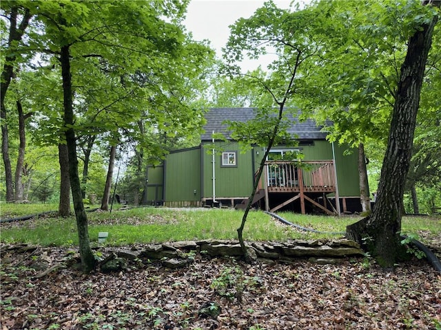 view of yard with a wooden deck