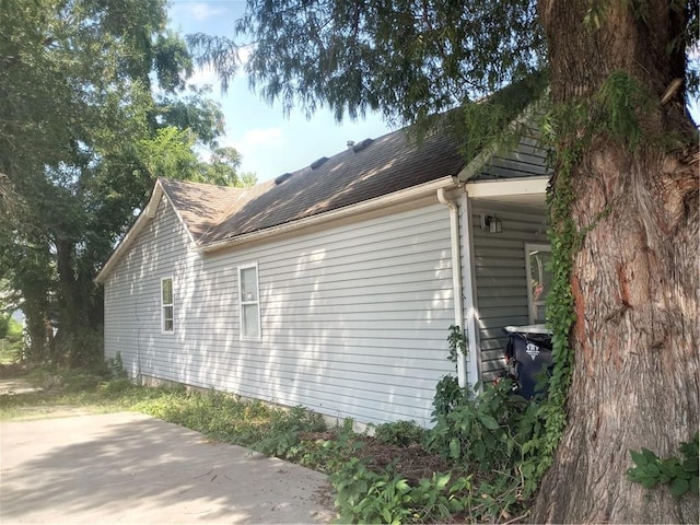 view of property exterior featuring a patio