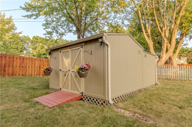 view of outdoor structure with a yard