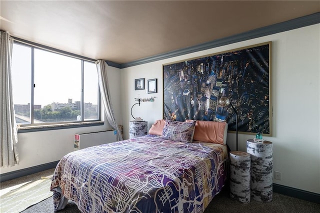 700 E 8th St Unit 11P, Kansas City, MO 64106 - bedroom featuring carpet and baseboards