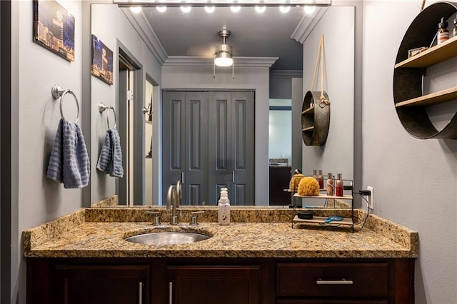 700 E 8th St Unit 11P, Kansas City, MO 64106 - bathroom featuring vanity, ornamental molding, and ceiling fan