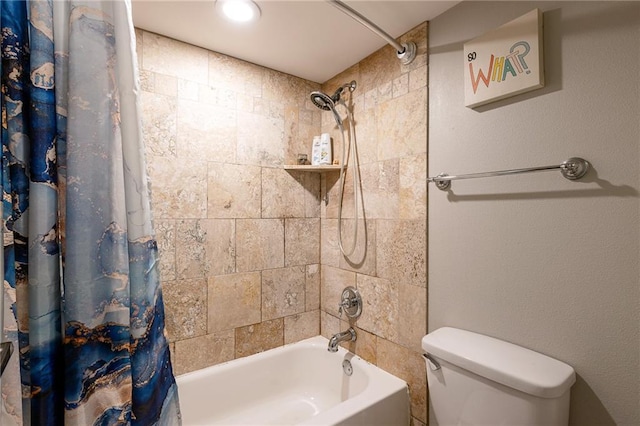 bathroom with toilet and shower / bath combo with shower curtain