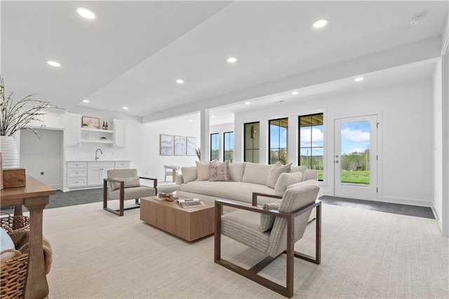 1816 NE Lashbrook Cir, Lees Summit, MO 64086 - living room with recessed lighting, baseboards, and light carpet