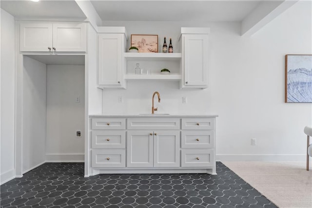 1816 NE Lashbrook Cir, Lees Summit, MO 64086 - kitchen featuring white cabinets, open shelves, light countertops, and a sink