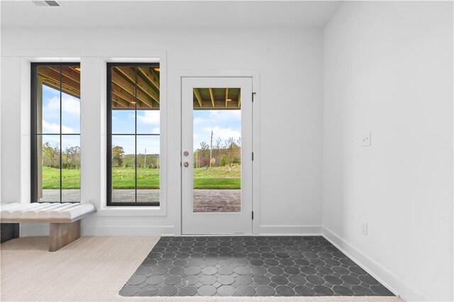 1816 NE Lashbrook Cir, Lees Summit, MO 64086 - doorway with baseboards, visible vents, and dark carpet