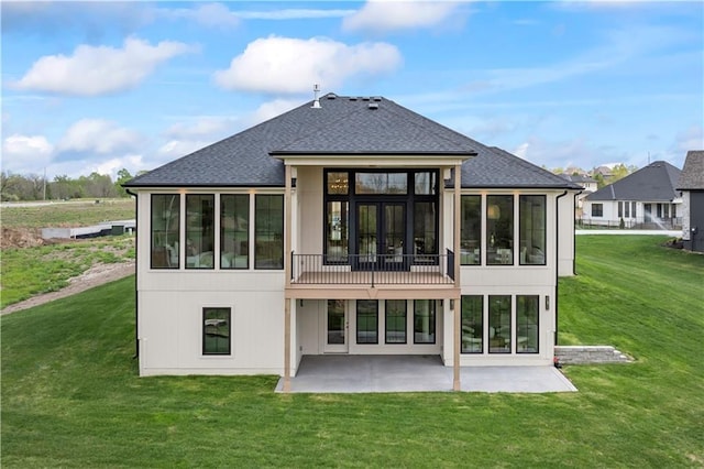 1816 NE Lashbrook Cir, Lees Summit, MO 64086 - rear view of house featuring a lawn, roof with shingles, a sunroom, and a patio area