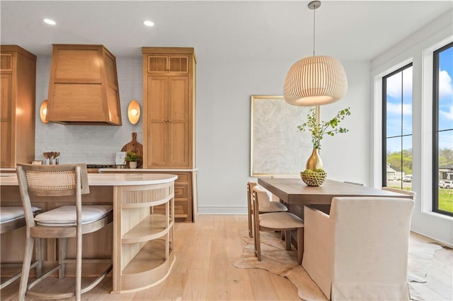 1816 NE Lashbrook Cir, Lees Summit, MO 64086 - dining room with recessed lighting, light wood-style flooring, and baseboards