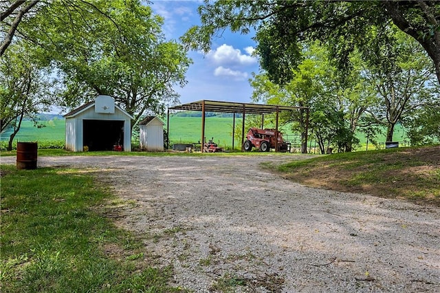 view of front of property with a storage unit