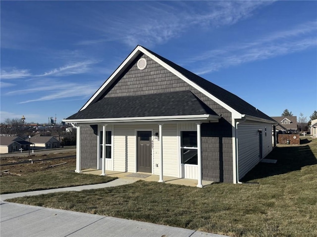 view of front of home with a front lawn