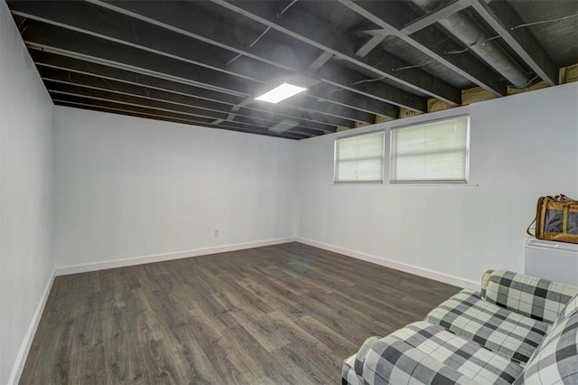 basement featuring dark wood-type flooring