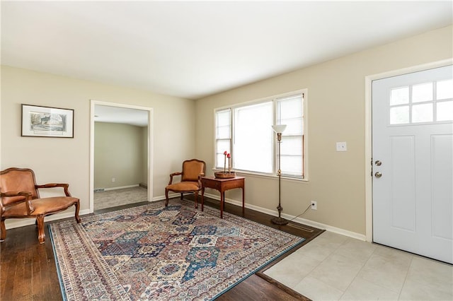 foyer with light hardwood / wood-style floors