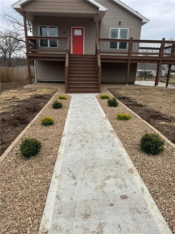 view of front of home featuring stairs