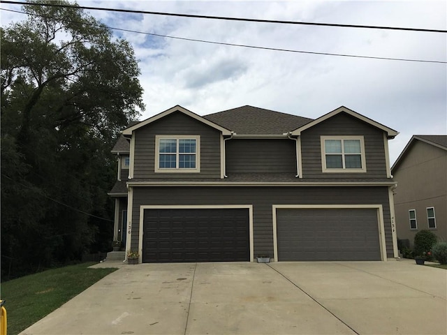 view of front of property featuring a garage