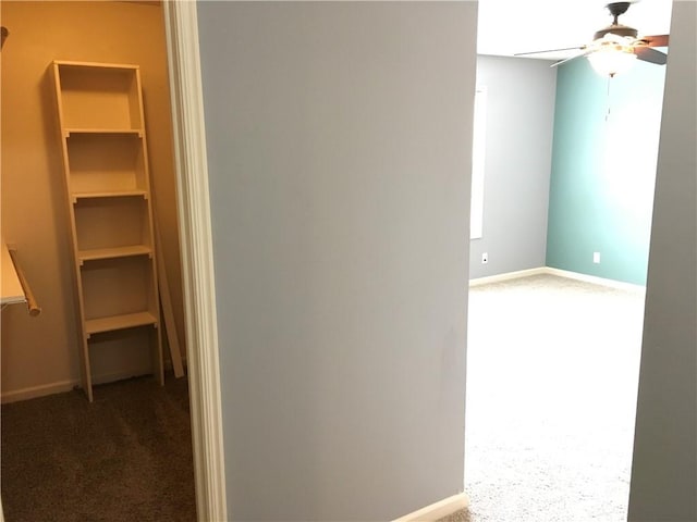 interior space with dark colored carpet