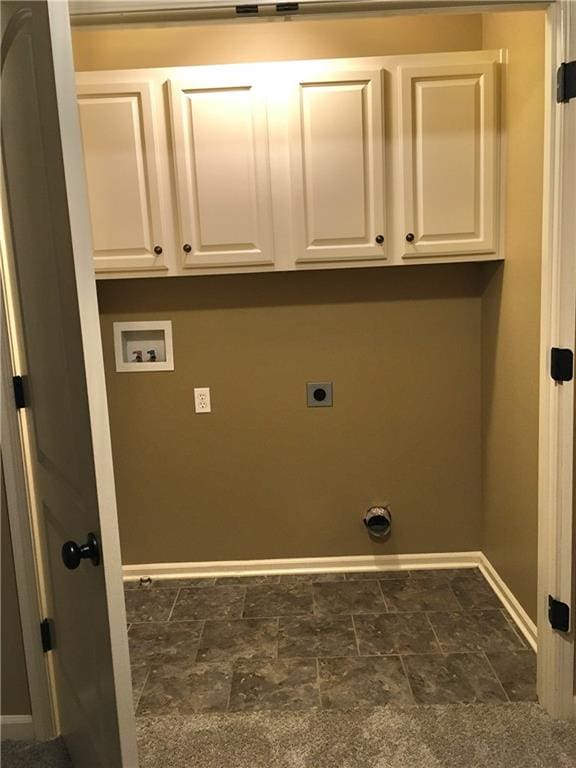 washroom featuring hookup for a washing machine, cabinets, and hookup for an electric dryer