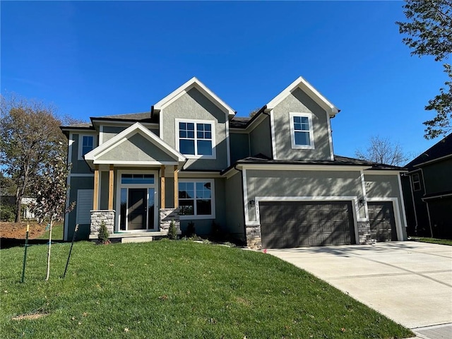 craftsman house with stone siding, a front lawn, concrete driveway, and stucco siding