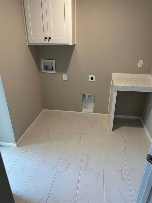 clothes washing area featuring cabinet space, baseboards, marble finish floor, washer hookup, and electric dryer hookup