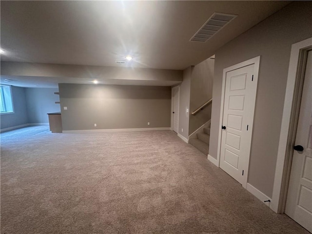 basement with carpet flooring