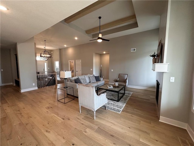 2007 Foxtail Pt, Kearney, MO 64060 - living room with light wood finished floors, a chandelier, ceiling fan, and recessed lighting