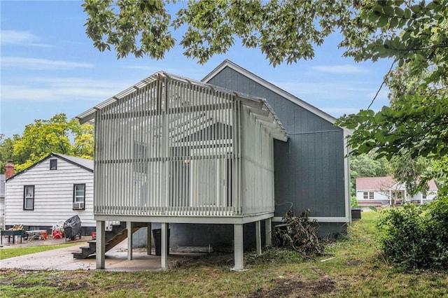 6825 Walrond Ave, Kansas City, MO 64132 - view of property exterior featuring stairway