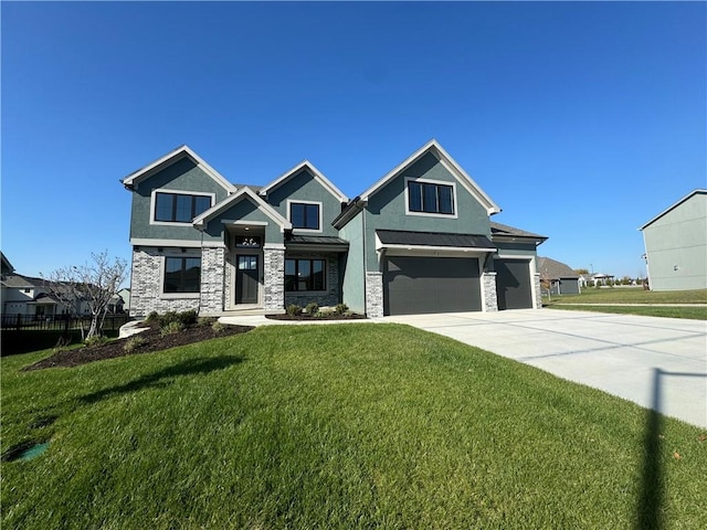 craftsman-style house featuring a front yard and a garage