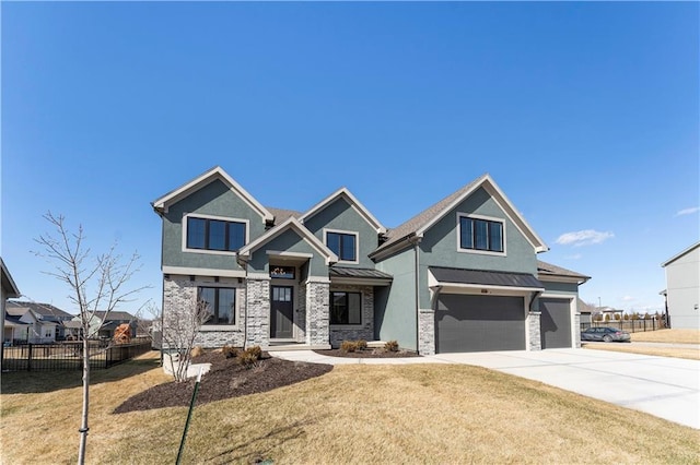 craftsman house with a front lawn, a standing seam roof, an attached garage, and fence