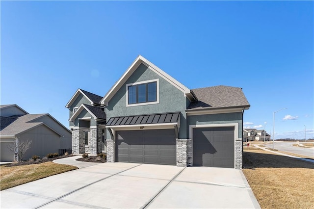 view of front of home with metal roof, a standing seam roof, concrete driveway, and stucco siding