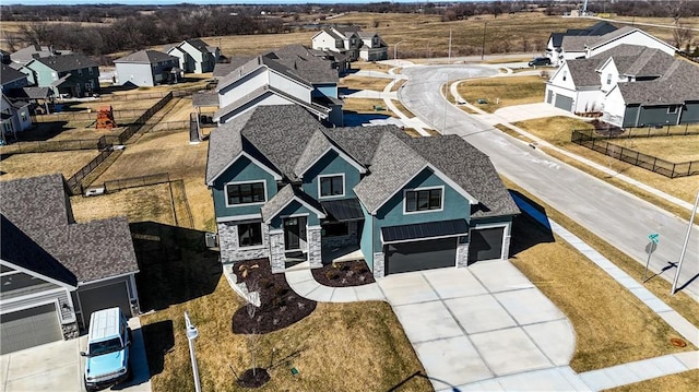 drone / aerial view with a residential view